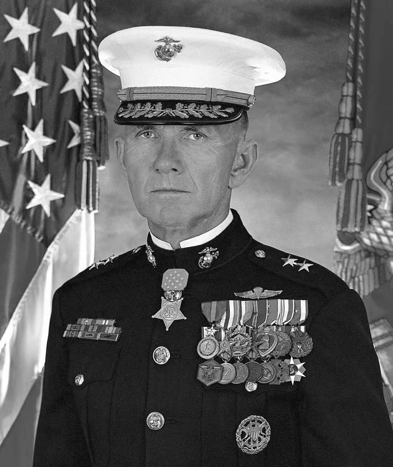 Official black-and-white portrait of Major General James E. Livingston in USMC dress uniform, Medal of Honor displayed