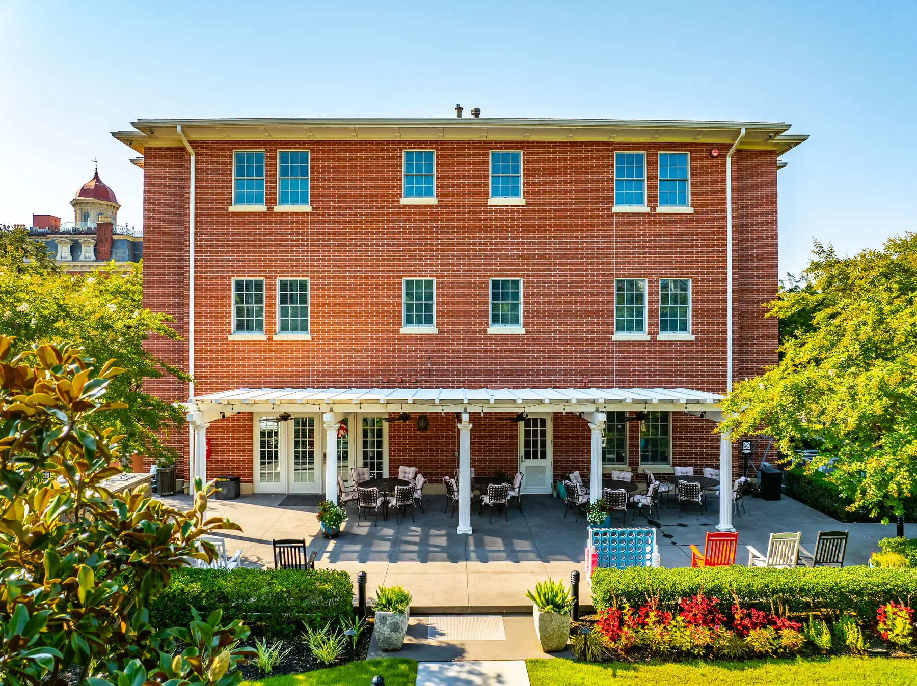 The rear patio and pergola at the Charleston Fisher House